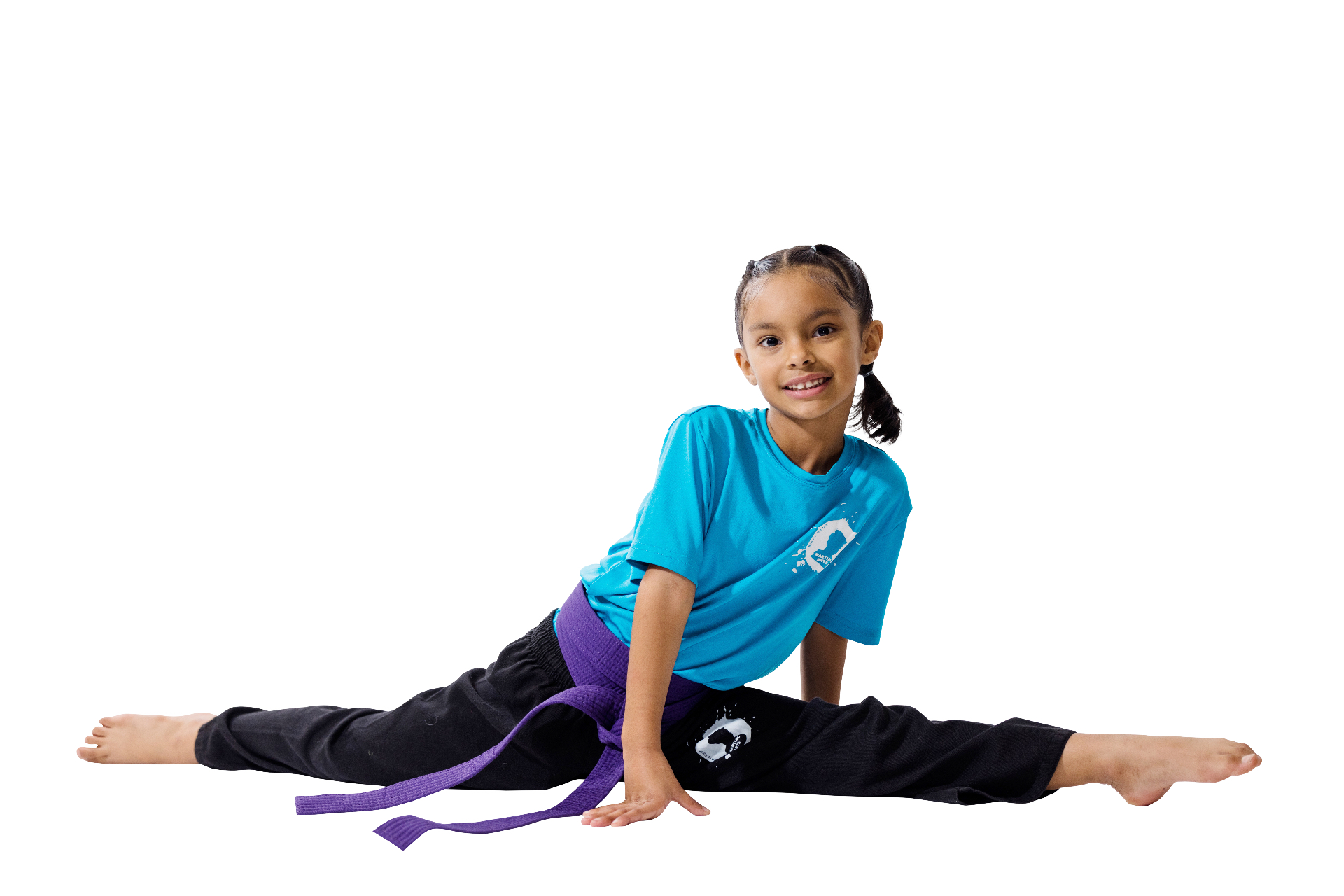 Roundhouse student demonstrating a full split — earned flexibility, earned belt.